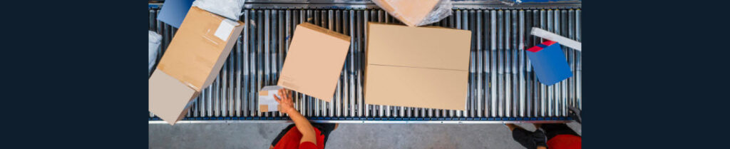 conveyor in warehouse with boxes